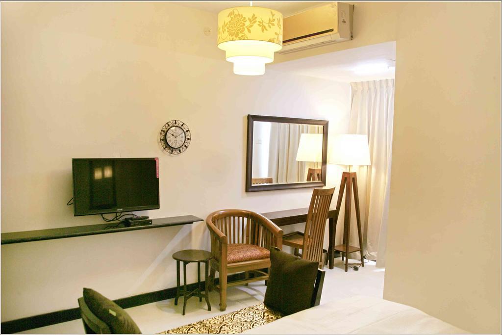 Hotel Highnest Singapperumalkovil Номер фото